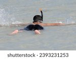 Small photo of NEIL (Shaheed Dweep - Andaman Islands), INDIA - November 26, 2023. Indian tourists on the Bharatpur beach. At low tide in the Andaman Sea. Adjacent to the harbor on Neil Island.
