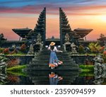Women tourists standing at Besakih temple in Bali, Indonesia.