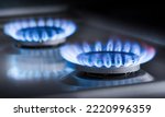 Two burning gas burners on a...