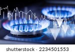 Small photo of two gas burners and price reduction concept chart