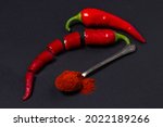 Red Ground Pepper Next To A...