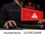 Computer system hack warning. The concept of a cyber attack on a computer network. Malicious software, viruses and cybercrime. Hacking personal data