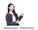Small photo of Asian professional working woman who wears black suit with braces on teeth is pointing hand to present as thump up isolated on white background.