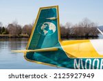 Small photo of Wangen-Lachen, Switzerland, February 13, 2022 Tail of a Mooney M20 exhibition plane on a small airfield