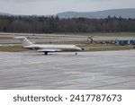 Small photo of Zurich, Switzerland, January 18, 2024 9H-VJM Vista Jet Bombardier Global 6000 aircraft is taxiing in the rain during the world economic forum in Davos