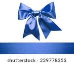 Blue ribbon bow isolated on...