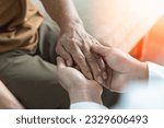 Small photo of Parkinson disease patient, Alzheimer elderly senior, Arthritis person's hand in support of geriatric doctor or nursing caregiver, for disability awareness day, ageing society care service