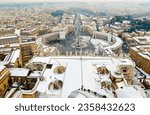 Small photo of An unusual winter view of snow-covered St. Peter's Square, from the top of the dome of St. Peter's Cathedral. Vatican City. Rome. 11.02.2012.