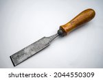 Antique Forged Chisel On Wood...
