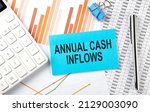 Small photo of ANNUAL CASH INFLOWS text on sticker on diagram background