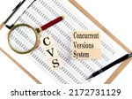 Small photo of CVS - Concurrent Versions System text on a wooden block on chart background