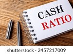 Cash ratio text on notebook on...