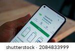 upwork app on android. hand... | Shutterstock . vector #2084833999