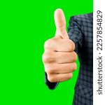 Small photo of Businessman showing thumbs up, Male teen hand shows thumbs up, isolated on green, thumbs up gesture. Assent, approval, encouragement.