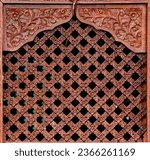 Small photo of Traditional Wooden Window textured background, Wood Carved Wall or Ceiling Panel, pattern photography. Wooden window carved details on a Hindu temple. Ancient window texture.