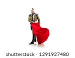 Small photo of Torero in blue and gold suit or typical spanish bullfighter isolated over white studio background. The taming, achieving the goal, mortification, conquest, boss, leadership, battle, win, winner