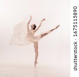Small photo of Graceful classic ballerina dancing, posing isolated on white studio background. Tender peach cloth. The grace, artist, movement, action and motion concept. Looks weightless, flexible. Fashion, style.