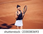 Small photo of Young, smiling, happy wan in sportswear, tennis player standing with tennis racket, showing winning emotions. SUccessful, winning game. Concept of sport, hobby, active lifestyle, health, strength, ad