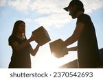 Small photo of Man and woman, volunteers holding box with food, meds and clothes. Humanitarian help for people in need. Concept of humanitarian aid, assistance and support, care, social programs