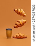 Small photo of Levitating food. Crispy fresh croissants flying over coffee cup to go on brown background. Concept of food, bakery, breakfast ideas, taste, freshness. Poser. Copy space for ad