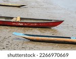 Stranded Wooden Canoe At Low...