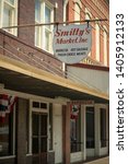 Small photo of Lockhart, Texas - May 23 2019: A sign for the popular Smitty's Market barbecue