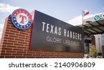 Small photo of Arlington, TX - March 30, 2022: MLB Baseball Texas Rangers' Globe Life Field entrance with flag