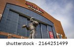 Small photo of Indianapolis, IN - May 29, 2022: NFL Indianapolis Colts' Lucas Oil Stadium with Peyton Manning statue