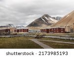 Old Soviet settlement Pyramiden in Spitzbergen, Svalbard. Red residential houses. Abandoned coal mining town.