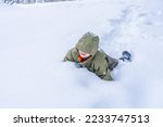A boy playing in snow. forest. Winter holiday concept. Special filter, selective focus. High quality photo