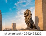 Small photo of CAIRO, EGYPT - DECEMBER 29, 2021: The massive statue of a lion decorates the Qasr El Nil bridge, connecting Cairo Downtown with Gezira Island in Cairo, Egypt