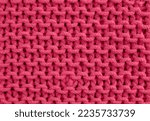 Small photo of super chunky knitted background. Knitted structure. viva magenta