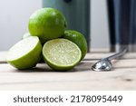 Small photo of macro photo of lime tahiti (limao taiti)) is a species of citrus fruit, known in Brazil by the name of lime-tahiti, lime-tahiti, or simply "lemon", being classified within acidic limes