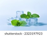 Ice cubes and fresh mint leaves ...