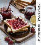 Small photo of Strawberry jam is made from strawberries, sugar, and lemon juice that is cooked until thickened. This jam can be used for spreading white bread, filling cakes, etc.