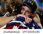 Small photo of Rio de Janeiro, Brazil 08.17.2016: Womens beach volleyball podium ceremony, Rio 2016 Summer Olympic Games. American players April Ross and Kerri Walsh Jennings of team USA celebrating bronze medal.