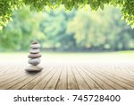 Zen Stones On Empty Wooden With ...