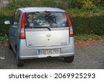 Small photo of Viersen,Germany-November 01,2021:Daihatsu Cuore L251 is a small car model from the Japanese manufacturer Daihatsu from 2003-2007 other name as Mira and Charade