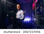 Small photo of Joyous system administrator with laptop colocation data center