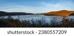 Small photo of Fall season background panoramic image of Allegheny state forest mountain lake rimrock.