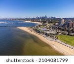 Small photo of St Kilda, Victoria, Australia - December 2021: Aerial view of St Kilda Beach with Melbourne city skyline in background.