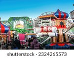 Small photo of St Kilda, Victoria, Australia - March 24, 2023: The Arabian Merry ride, with elephant-themed carriages, at Luna Park, a popular century-old amusement park in Melbourne's bayside suburb of St Kilda.