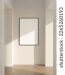 Small photo of single picture of frame mockup poster hanging on the beige wall in the midlle of the corridor in the minimalist interior