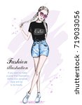 beautiful young girl in stylish ... | Shutterstock .eps vector #719033056