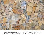 Texture of stone wall. Cladding of seamless flagstone. Detail of outdoor architecture finished wall. Very useful for landscape.