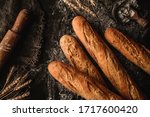 freshly bread baguettes on... | Shutterstock . vector #1717600420