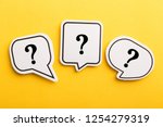 Question mark speech bubble isolated on yellow background.