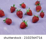 Strawberries On A Purple...