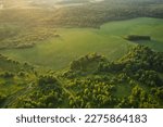 Beautiful aerial landscape on green backdrop. Beautiful scenery. Beautiful natural landscape. Natural background. Air transportation. Aerial view. Top view.