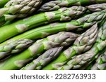 Asparagus. Fresh green asparagus background. Healthy food concept. Vegan healthy food. Asparagus pattern. Top view copy space
